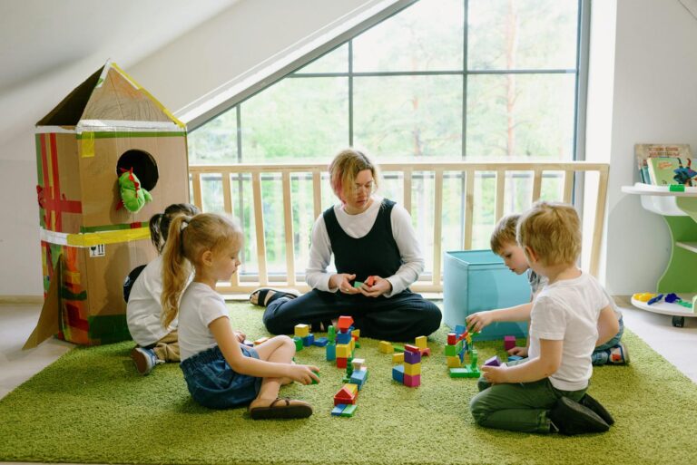 A Woman Playing with the Children in the School